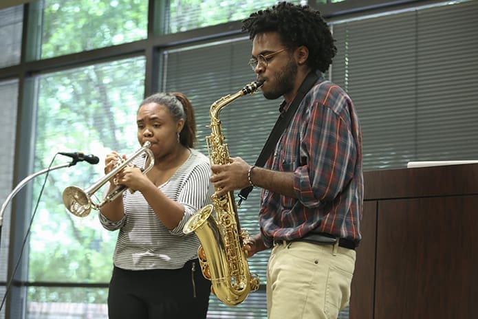 Paul Duhé performs the Wayne Shorter jazz standard “Footprints” on his alto saxophone, accompanied by his 18-year-old sister Imani on trumpet. Paul, 20, a 2016 summer intern with the Justice and Peace Ministries, is a rising junior, majoring in music at Bard College in Annandale-on-Hudson, N.Y. Photo By Michael Alexander