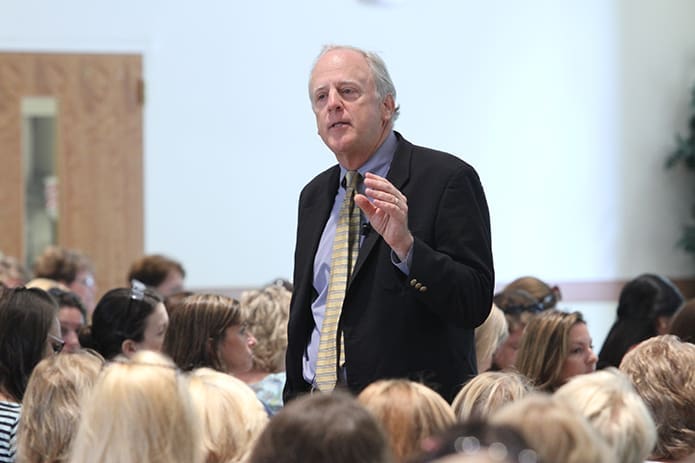 Comer Yates, executive director of the Atlanta Speech School, provides the keynote address for the 10th anniversary gathering of the Summer Education Institute at Holy Family Church, Marietta, Aug. 7. He presented to some 365 attendees from 30 parish preschool programs. Photo By Michael Alexander