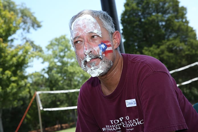 Deacon Johnny Rentas, a native of Puerto Rico, also took a cream pie in the face for a good cause. Photo By Michael Alexander