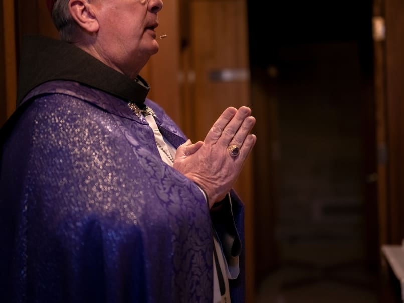 Archbishop Gregory J. Hartmayer, OFM Conv., processess into the Cathedral of Christ the King on the evening of the Tenebrae service. Photo by Johnathon Kelso