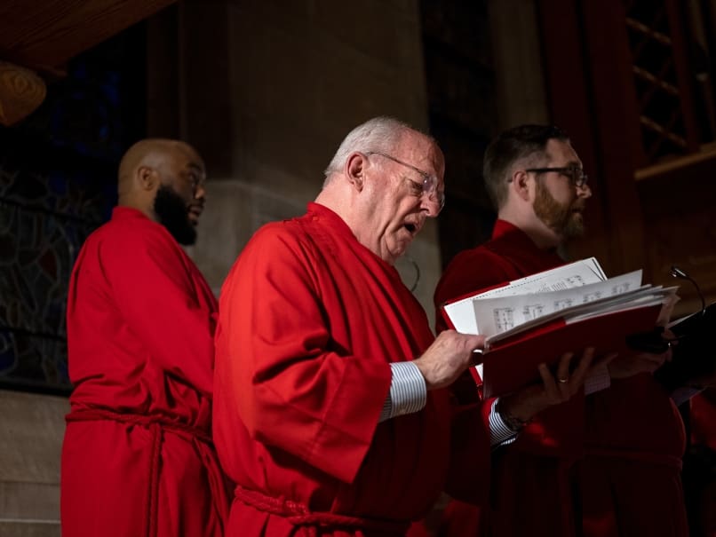 The choir sings the liturgy during a Tenebrae service at Cathedral of Christ of the King. Tenebrae is a solemn prayer service of song and Scripture, marked by the gradual extinguishing of lights until the service ends in darkness and silence. Photo by Johnathon Kelso