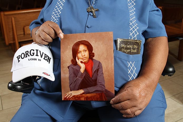 Thomas Brito Sr. holds a photo of his late daughter, Cheryl. The firstborn of seven children was murdered in 1983. Extending forgiveness and mercy was crucial for Brito to accept God’s healing grace. Photo By Michael Alexander