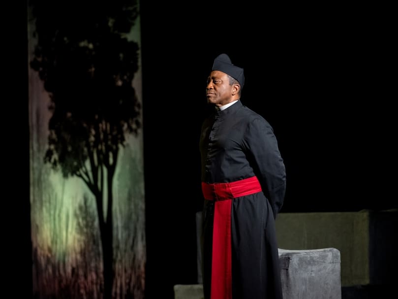 Jim Coleman takes the stage in "Tolton: From Slave to Priest," at St. Mary's Academy. The school was one of three hosts for the play during early November. Photo by Johnathon Kelso