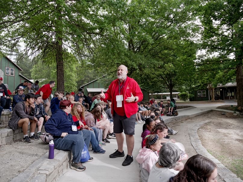 Deacon Greg Orf offers a morning prayer to start the day at Toni's Camp in Rutledge. Photo by Johnathon Kelso