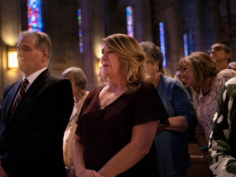 Family members of Evan Glowzinski look on during Laying of Hands during tthe Rite of Ordination to the transitional diaconate May 21 at the Cathedral of Christ the King. Photo by Johnathon Kelso
