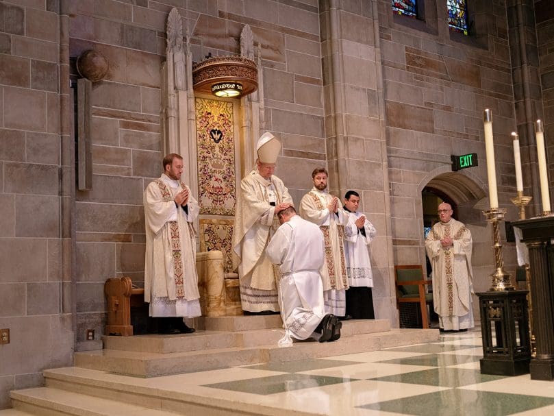 Archbishop Gregory J. Hartmayer, OFM Conv., lays hands on Deacon Evan Glowzinski during ordination to the transitional diaconate. Photo by Johnathon KelsoArchbishop Gregory J. Hartmayer, OFM Conv., lays hands on Deacon Evan Glowzinski during ordination to the transitional diaconate. Photo by Johnathon Kelso