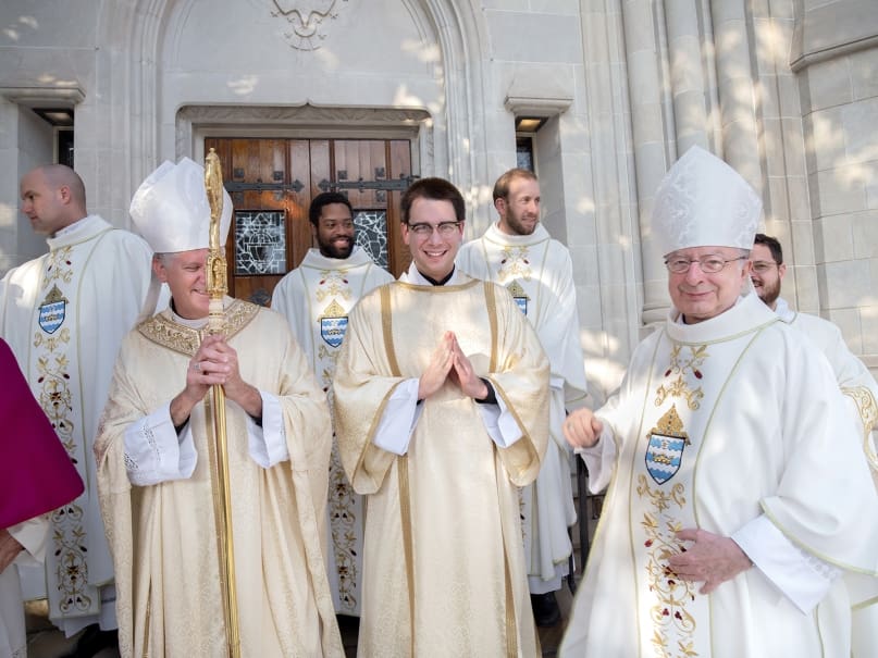 Deacon Pete Coppola, center, stands with Bishop Bernard E. Shlesinger III, left, and Bishop Joel M. Konzen, SM, right, preceding the rite of ordination to the transitional diaconate. Photo by Johnathon Kelso