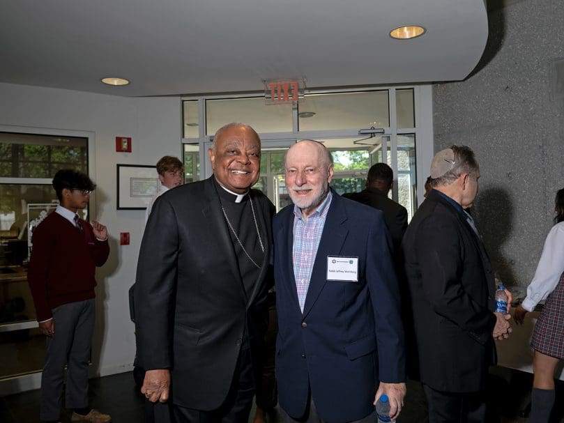 Cardinal Wilton Gregory of Washington, left, visits with Rabbi Jeffrey Wohlberg at the Lyke House in Atlanta during a dialogue of the National Council of Synagogues and the U.S. Conference of Catholic Bishops. After the launch in Atlanta, the participants made stops in Birmingham and Mobile, Alabama. Photo by Johnathon Kelso