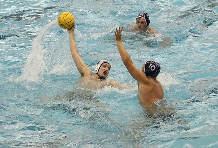 St. Pius’ Perry Brandes scores one of his two second half goals during the team’s 15-14 loss to defending state champions, Norcross, in the Oct. 12 semi-final match of the Georgia High School Water Polo Association (GHSWPA) state championship at the Cumming Aquatic Center. Photo By Michael Alexander