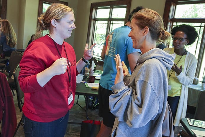 Angela O’Donoghue, left, the youth minister at Our Lady of the Assumption Church, Atlanta, and Dawn Eagan, the middle school youth minister at St. Francis of Assisi Church, Raleigh, N.C., participate in an opening mixer Sept. 21 in order to get to know other youth ministers on hand for the 2016 Institute for Catholic Youth Ministry at Covecrest in Tiger, Ga. Photo By Michael Alexander