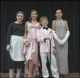 Middle school students at IHM School recently presented a dinner theater featuring a 1920s comedy at the school. (L-r) Rachel Ponce de Leon, Ella Anastasiades, Andrew Anastasiades and Stephanie Benzur perform in the show.
