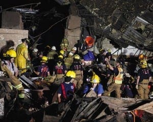 Oklahoma National Guard soldiers and rescue workers dig through the rubble of Plaza Tower Elementary school May 21 after a devastating tornado ripped through Moore, Okla., the previous day. The tornado left a 20-mile path of death and destruction. 