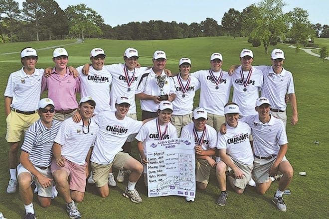 Coach Jeff Decker, back row, center, holds the state championship trophy as the Marist School golf team poses for a photo. The team golfers include (front row, l-r) Will Kesterton, Hodges Markwalter, Mark Maggard, Will Duma, Will Chandler, Austin Summers, Robert Yates (back row, l-r) Chris Harvey, Victor Corrigan, Thomas Davenport, Joe Quirk, Decker, Jack Larkin, Sean Murphy, Mitchell Yates and Andrews Owen.