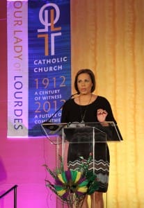 Channel 2 Action News anchor Jovita Moore serves as mistress of ceremonies during the Our Lady of Lourdes centennial anniversary gala at the Atlanta Marriott Marquis Hotel, Feb. 9. (Photo By Michael Alexander)