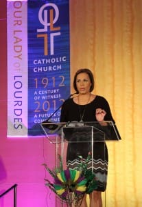 Channel 2 Action News anchor Jovita Moore serves as mistress of ceremonies during the Our Lady of Lourdes centennial anniversary gala at the Atlanta Marriott Marquis Hotel, Feb. 9. (Photo By Michael Alexander) 