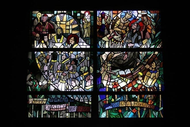 These two stained glass windows were installed last fall in the Holy Family Chapel on the campus of Marist School, Atlanta. Swiss artist Milo Piuz originally created the windows for a Marist seminary in Bettendorf, Iowa back in 1960. The window on the left depicts the first Marists' solemn moment of profession and the window on the right recounts the martyrdom of St. Peter Chanel. Photo By Michael Alexander