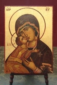 This icon of Mary, the Mother of God, is the work of Damascus, Syria iconographer George Jannoura. It was a gift to Archimandrite John Azar, pastor of St. John Chrysostom Melkite Church, Atlanta, from his cousin in Syria. According to Archimandrite Azar this icon is sometimes called 