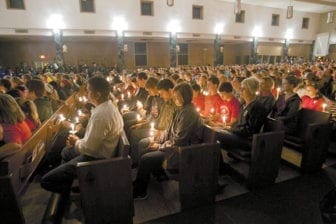 People take part in a candlelight vigil April 18 at the Church of the Assumption in West, Texas, to remember those who lost their lives or were injured in a massive explosion at the area’s fertilizer plant April 17. The explosion near Waco, Texas, killed 14 people and injured more than 160 others.