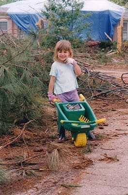 Four-year-old Mattie Gereben was one of the more than 400 volunteers that came together in a relief effort for All Saints Church parishioners who incurred damage as a result of the April 9, 1998 tornado that swept through the community. (Photo By Michael Alexander)