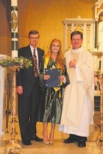 Anna Fink, a 2013 graduate of Blessed Trinity High School, was recognized for her volunteerism. Fink is shown with Frank Moore, Blessed Trinity principal, left, and Msgr. Joseph Corbett, vicar general.