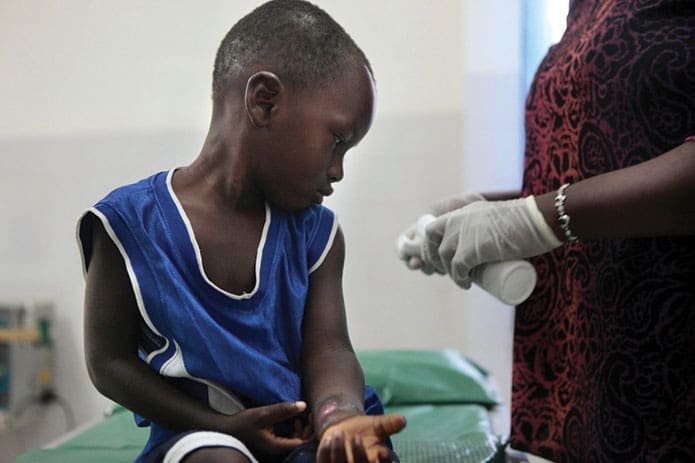 A child in Cote d’Ivoire, West Africa, receives treatment from medicine supplied by MAP International. More than 2 billion people have benefited from its work since its founding in 1954 as a Christian ministry to deliver medicine and medical supplies to ministries serving the poor around the globe.