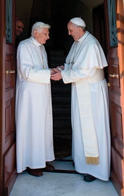 Retired Pope Benedict XVI greets Pope Francis at the Vatican May 2. The 86-year-old retired pontiff, who had been staying at the papal summer villa in Castel Gandolfo since retiring Feb. 28, returned to the Vatican to live in a monastery in the Vatican Gardens.