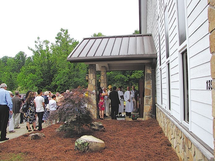 Archbishop Wilton D. Gregory dedicates the new parish life center at St. Helena Church, Clayton, June 2.