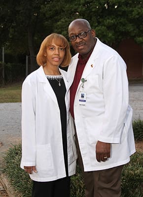 Dr. Kim Jelks, left, is a commissioned officer with the U.S. Public Health Service. Her husband Levi, right, is a permanent deacon and a registered nurse who works as cardiac case manager at Southern Regional Medical Center, Riverdale. He is also enrolled in a Family Nurse Practitioner Program, which he is scheduled to complete in 2014. Photo By Michael Alexander
