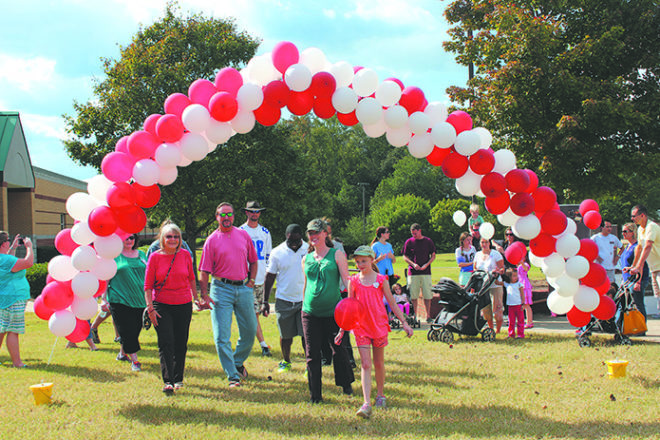 Over 100 people attended the archdiocesan Embrace ministry's annual Infant Loss Remembrance Walk Oct. 13. The walk was held on the grounds of Blessed Trinity High School, Roswell.