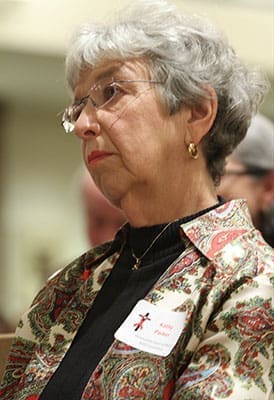 Kathy Parker of Immaculate Heart of Mary Church, Atlanta, is seated during the homily at the 2012 World AIDS Mass. Parker headed up the AIDS ministry at her parish for 13 years. Her work with the ministry was, in part, inspired by her Peace Corps experience in Ivory Coast, West Africa back in the mid 1960s. Photo By Michael Alexander