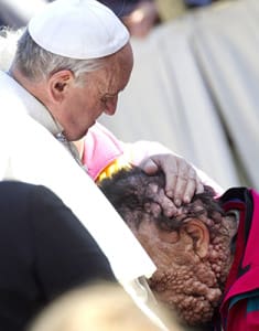 Pope Francis embraces Vinicio Riva, 53, during his general audience in St. Peter's Square at the Vatican Nov. 6. Riva, who is afflicted with neurofibromatosis, said receiving the pope's embrace was like being in paradise. Riva is from a small village near Vicenza in northern Italy. 