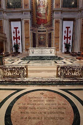 A floor marker where the casket of President John F. Kennedy rested during his funeral Mass is seen Oct. 24 at the Cathedral of St. Matthew the Apostle in Washington. It reads: 
