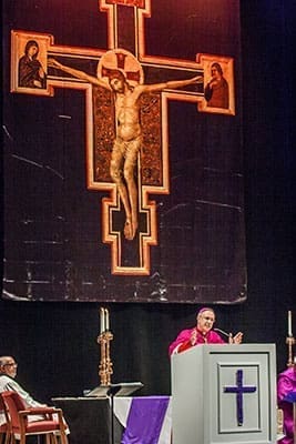 Auxiliary Bishop Luis R. Zarama preaches a homily in Spanish at the Rite of Election and Call to Continuing Conversion. Just over 1,900 candidates and catechumens participated in the rite and will join the Catholic Church in their respective parishes on Holy Saturday of the Easter Triduum. Photo by Thomas Spink