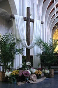 The purple draped cross of Lent has been replaced with the white of Easter at the Monastery of the Holy Spirit, Conyers. Photo By Michael Alexander 