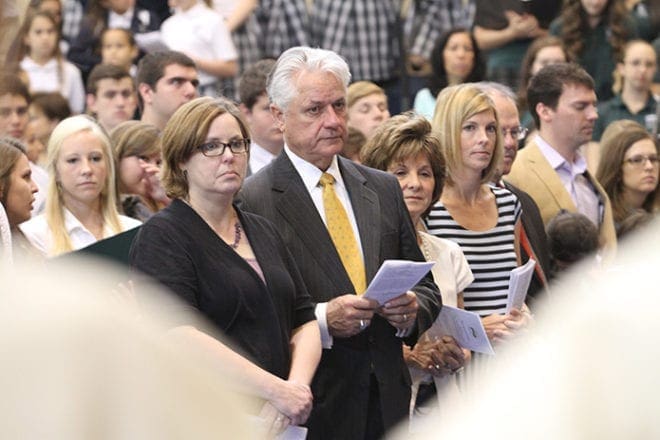Several of Pinecrest Academy’s founding families were on hand for the special anniversary liturgy including (front row, l-r) Laura Kelley, Doug and Brenda Tollett, Stacey Persichetti and John Gannon. Persichetti is the daughter of John and Arlene Gannon. Photo By Michael Alexander