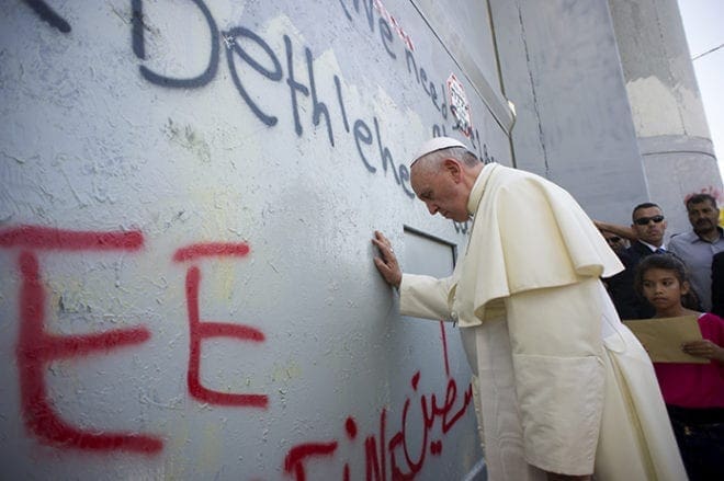 Pope Francis stops in front of the Israeli security wall in Bethlehem, West Bank, May 25. CNS photo/L'Osservatore Romano, pool