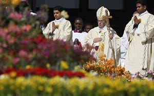 Pope Francis arrives to celebrate Easter Mass in St. Peter's Square at the Vatican April 20. CNS photo/Paul Haring
