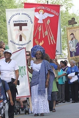 Thousands of participants from around the Archdiocese of Atlanta take part in the morning procession for the 18th Annual Eucharistic Congress at the Georgia International Convention Center. Photo By Michael Alexander