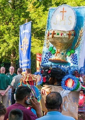 The new three-dimensional banner from Corpus Christi Church, Stone Mountain, illustrating the Eucharist with a chalice and host, was one of the eye-catching moments during the morning procession of the 19th annual Eucharistic Congress at the Georgia International Convention Center. Photo By Thomas Spink