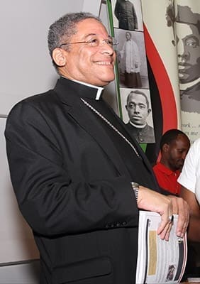 Bishop Joseph N. Perry, auxiliary bishop of Chicago and diocesan postulator for the Cause of Augustus Tolton, was on hand for the Eucharistic Congress to drum up support and inform Catholics about the cause for canonization surrounding the United States' first African-American priest, Father Tolton. Photo By Michael Alexander