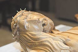 The life-size carving of Jesus was sculpted from poplar wood, and the artist spent much time in prayer and thought about depicting the face of Christ at peace. Photo By Larry Peterson