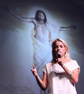 Emily Wilson did double duty during the July 12 Steubenville Atlanta Conference. Wilson led an afternoon workshop and she also sang in Ike Ndolo’s praise and worship band. Photo By Michael Alexander