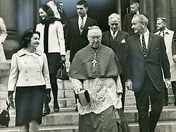 Then-Archbishop Patrick A. O'Boyle of Washington walks with U.S. President Lyndon B. Johnson following a 1968 Mass in Washington. The archbishop, who was later named a cardinal, was a vocal supporter of the Civil Rights Act, signed into law by Johnson July 2, 1964. He also integrated Catholic schools in the Washington Archdiocese 16 years before the Civil Rights Act. CNS file photo