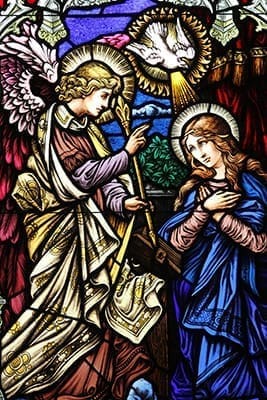 The image of the Annunciation is one of five stained glass windows in the Mary, Mother of the Eucharist Chapel at St. Monica Church in Duluth. The other windows depict the Holy Family, the flight into Egypt, the Presentation of Mary, and the Assumption. Photo By Michael Alexander