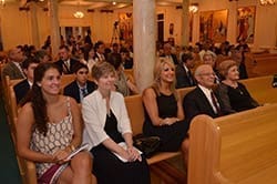 The family of Deacon Elie Hanna sits in the front pew of St. John Chrysostom Melkite Church, Atlanta, as his ordination on Aug. 10 begins. Shown are members of the new deacon’s family (l-r): Sarah Hanna (niece), Karen Hanna, Hanan Sleurer (sister) and Spiridon and Rouviette Hanna (parents). Photo by Cindy Connell Palmer