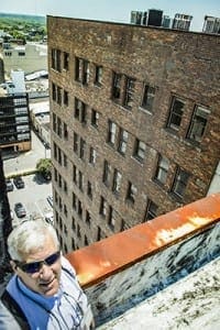 Michael Johnson, editor of the Savannah diocesan newspaper, will rappel “over the edge” of the historic Manger Building in Savannah for charity Oct. 31. Funds raised will benefit the Boy Scout program in coastal Georgia and Catholic Relief Services.