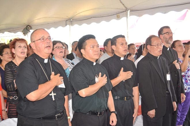 Among the honored guests at this year’s Fall Festival were (l-r): Bishop David P. Talley; Father Cong Tan Nguyen, parochial vicar at St. Theresa Church, Douglasville; Father Jesus David Trujillo-Luna, pastor of St. Theresa Church; Msgr. Francis Pham Van Phuong, pastor of Our Lady of Vietnam Church, Riverdale; and Father George Tsahakis, of the Greek Orthodox Cathedral of the Annunciation, Atlanta. PHOTO BY CINDY CONNELL PALMER
