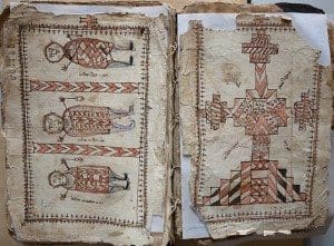 A medieval manuscript from the collection of the Dominican order in Iraq is seen in a restoration laboratory. Dominican Father Najeeb Michaeel operated the lab in Qaraqosh, Iraq, prior to Aug. 6 when Islamic State forces overtook the city. CNS photo/courtesy of Centre Numerique des Manuscrits Orientaux 