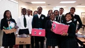 Eighth-grade students at St. Peter Claver Regional School in Decatur collected hygiene-related items in October to be distributed in Sierra Leone where residents are dealing daily with the Ebola virus and limiting exposure to it. Eighth-grade teacher Brenda Cheewah coordinated the project with Michael George of Christ Our Hope Church, president of the Sierra Leone community in Atlanta.