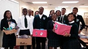 Eighth-grade students at St. Peter Claver Regional School in Decatur collected hygiene-related items in October to be distributed in Sierra Leone where residents are dealing daily with the Ebola virus and limiting exposure to it. Eighth-grade teacher Brenda Cheewah coordinated the project with Michael George of Christ Our Hope Church, president of the Sierra Leone community in Atlanta.